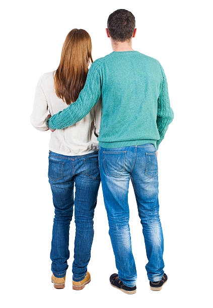 istock Back view of young embracing couple 494159260