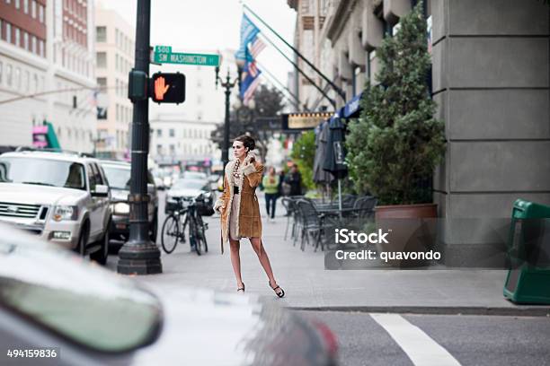 Beautiful Stylish Young Woman Fashion Model On Busy Downtown Street Stock Photo - Download Image Now