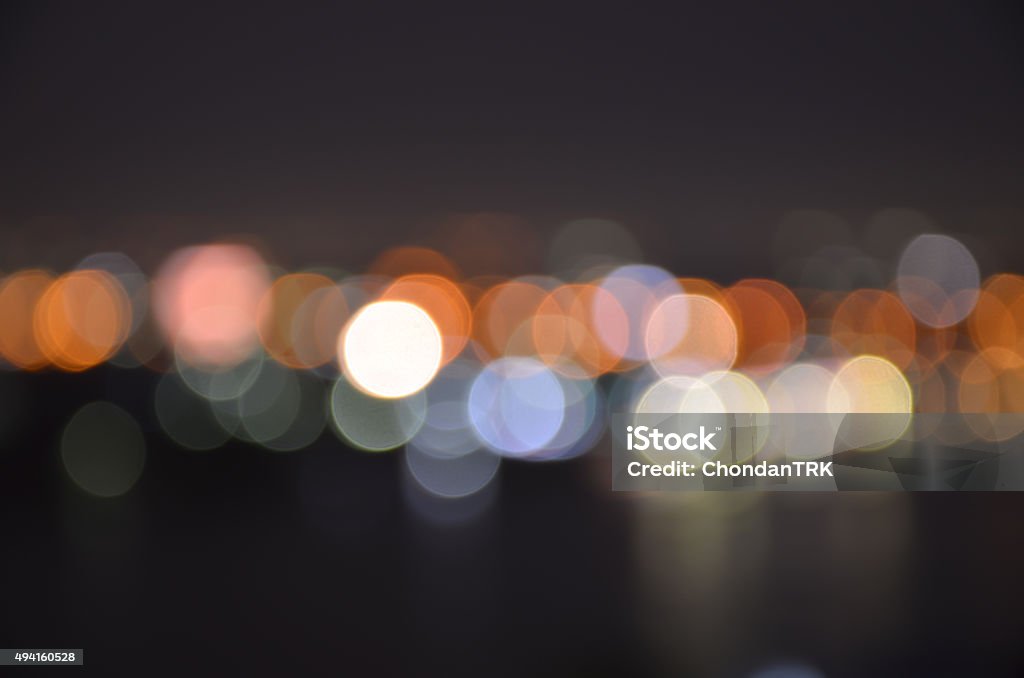 Dark city night light blur bokeh ; defocused background. 2015 Stock Photo