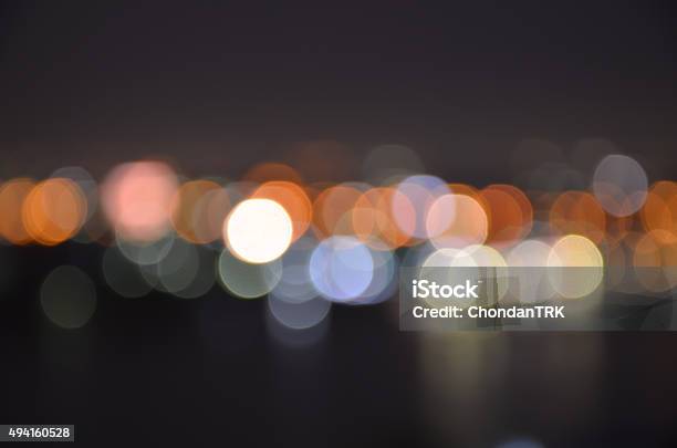 Dark City Night Light Blur Bokeh Defocused Background Stock Photo - Download Image Now