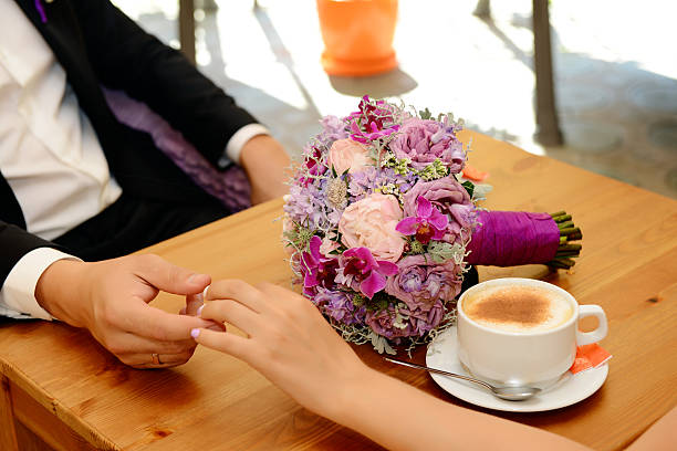 istock Bride and groom drinking coffee in a restaurant 494161582