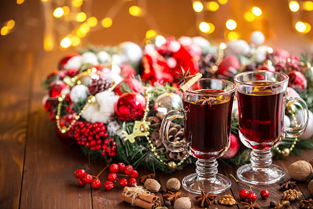 istock Christmas hot mulled wine with spices on a wooden table. 494164626