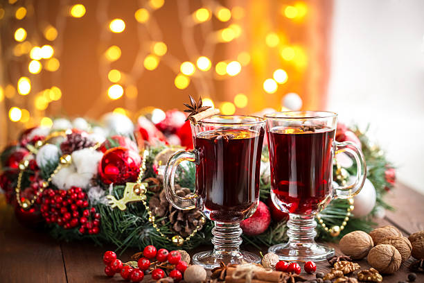 istock Christmas hot mulled wine with spices on a wooden table 494164750