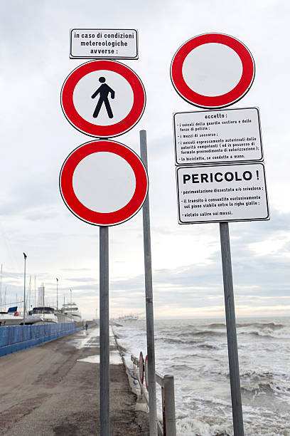 istock Warning signs on a pier - mediterranean sea, Italy 494165196