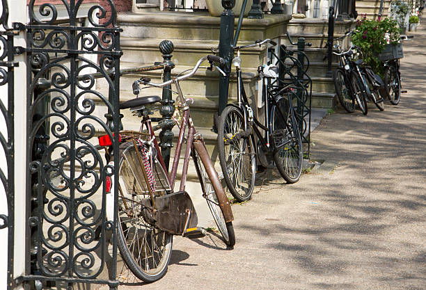 istock bikes on street of Amsterdam 494177655