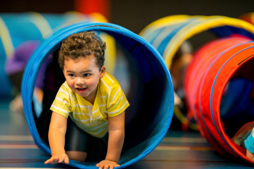 Diverse group of toddlers playing.