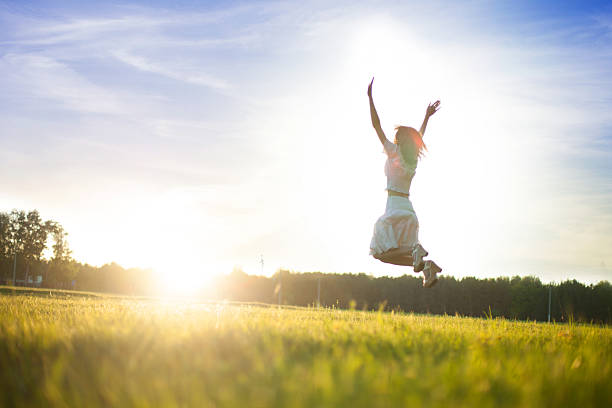 istock Beautiful girl walking on the field 494179827