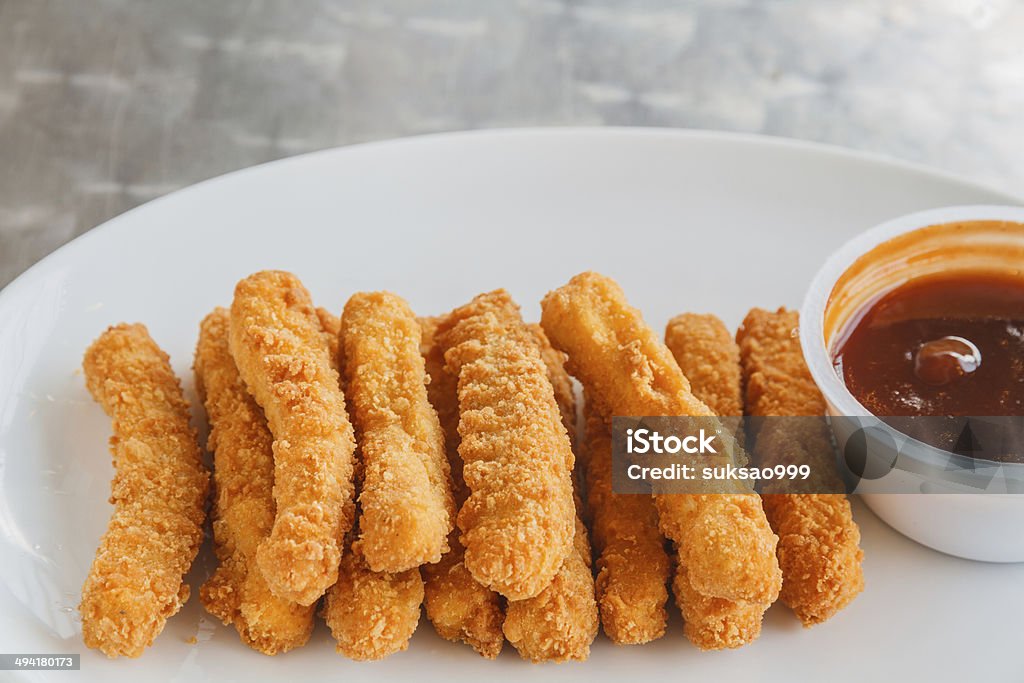 Chicken stick Fried chicken stick and sauce on white plate. Chicken Meat Stock Photo