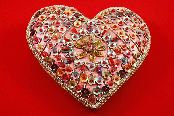 istock Heart-shaped pillow with floral motif 494180819