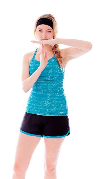 Young woman making time out signal with hands