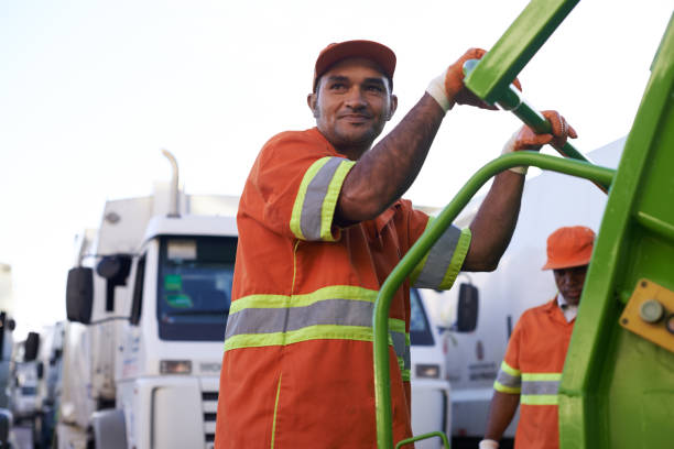 Let's get moving and cleaning Cropped shot of a team of garbage collectorshttp://195.154.178.81/DATA/i_collage/pi/shoots/783241.jpg dustman stock pictures, royalty-free photos & images