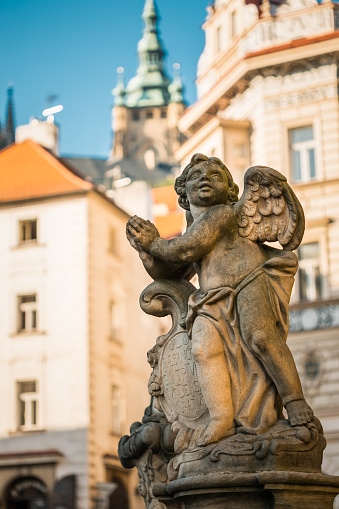 Detail of the Holy Trinity Column. Statue near St Nicholas Church. Lesser Town in Prague, Czech Republic