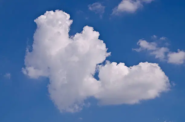 Blue Sky With Cloud and Clouds like the letter W
