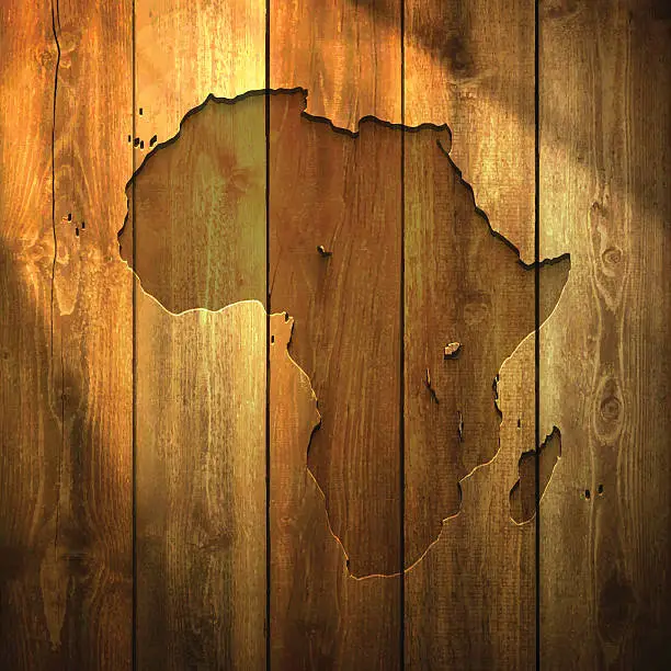 Vector illustration of Africa Map on lit Wooden Background