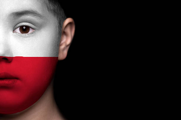 istock Human face painted with flag of Poland 494183281