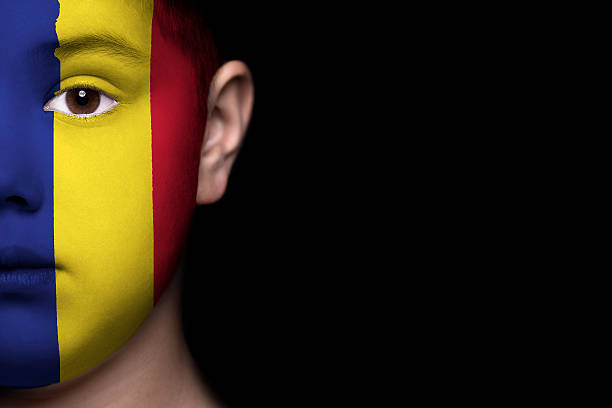 istock Human face painted with flag of Romania 494183285