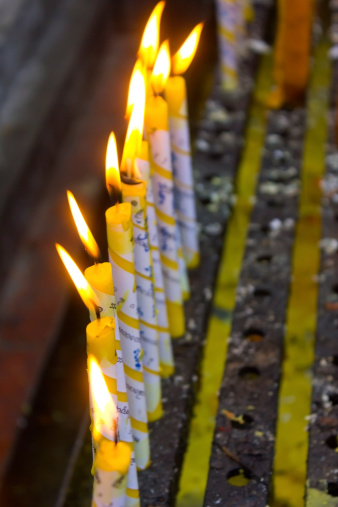 Candles for buddhism worshiping of wat phradhart lampangluang at lampang , temple in Thailand.
