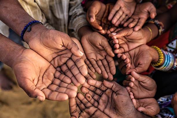 istock Hands of poor - asking for help, Africa 494184312