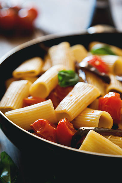istock italian pasta with cherry tomato eggplant and basil 494184364