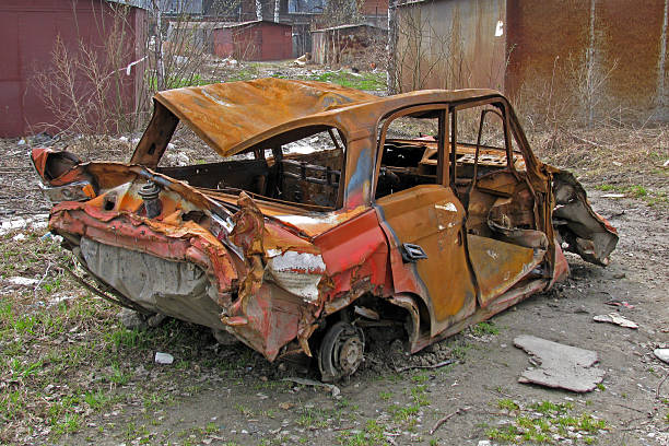 istock Rusty broken car in the street 494184612