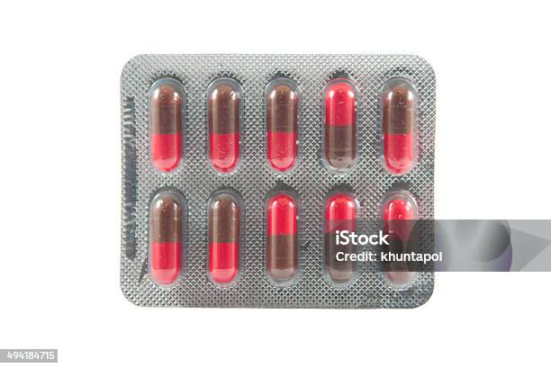 Red And Brown Capsule In Blister Pack Stock Photo - Download Image Now - Antibiotic, Blister, Capsule - Medicine