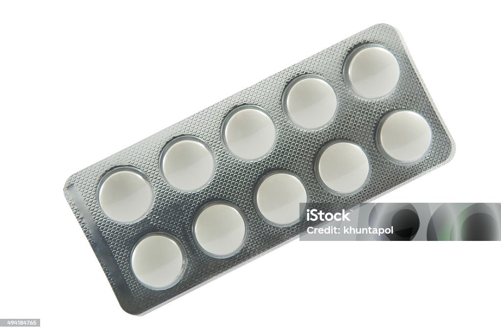 White medicine tablet blister pack White medicine tablet in blister pack and shadow effect Addiction Stock Photo