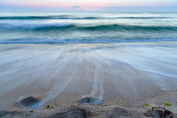 istock beach sand morning sea waves 494185636