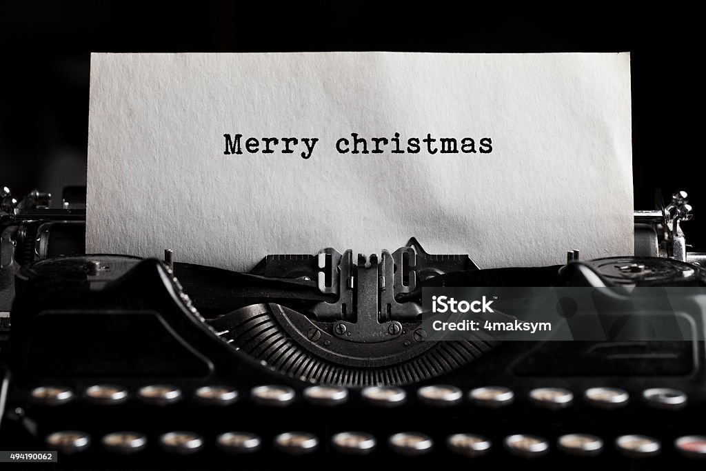 Merry Christmas and typewriter with paper sheet Typewriter Stock Photo
