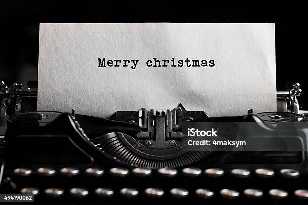 Merry Christmas And Typewriter With Paper Sheet Stock Photo - Download Image Now - Typewriter, 2015, Adult