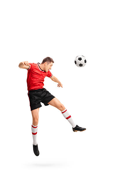 istock Young football player heading a ball 494190278