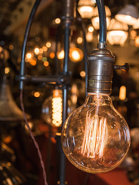 istock vintage electric carbon light, amber bulb Filament 494191052