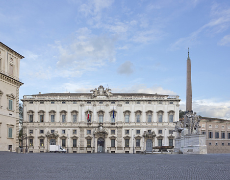 Constitutional Court of the Italian Republic (Palazzo della Consulta) in Rome, Italy  on Piazza del Quirinale with fountain (Fontana dei Dioscuri) on the right