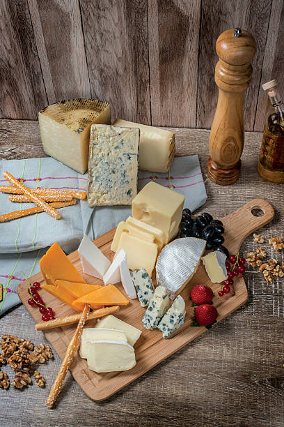 istock Cheese heaven. Cheese Mix Cheese brie, gouda cheese, blue cheese 494193146
