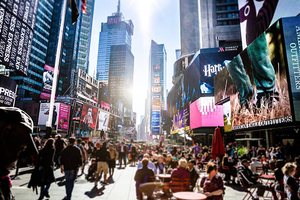 istock People and traffic in Times Square 494194112