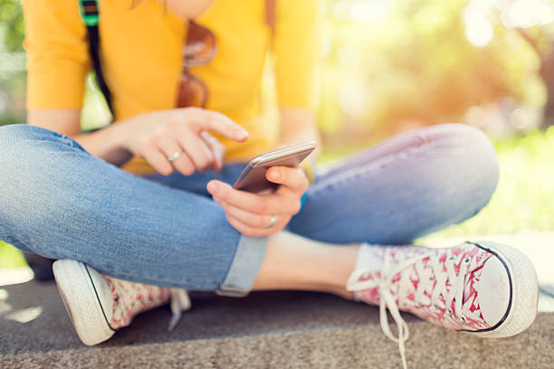 istock Girl text messaging on smartphone 494194144