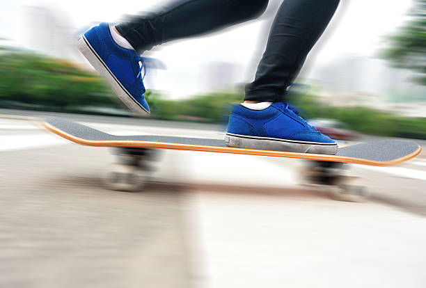 istock speeding skateboarding woman 494205613