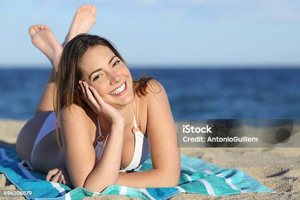Happy Woman With White Perfect Smile Resting On The Beach Stock Photo - Download Image Now