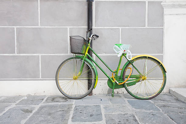 istock Green bike against the wall 494206781