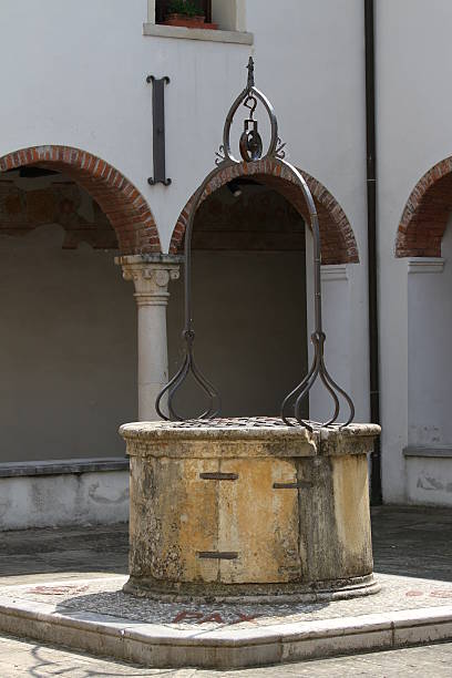 istock ancient well in marble and stone 494206851