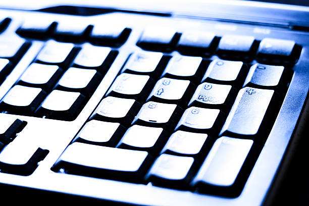 istock Close-up of typing male hands on keyboard 494207111