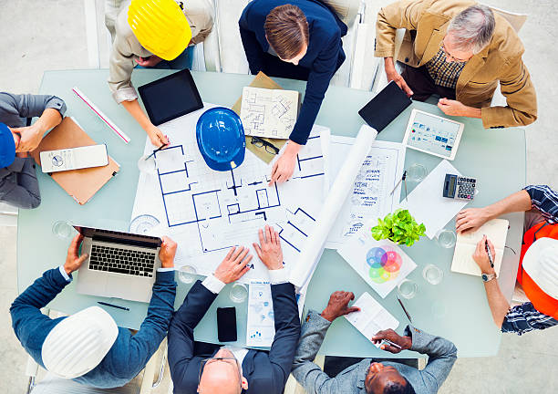 istock Group of Architects Planning on a New Project 494208807