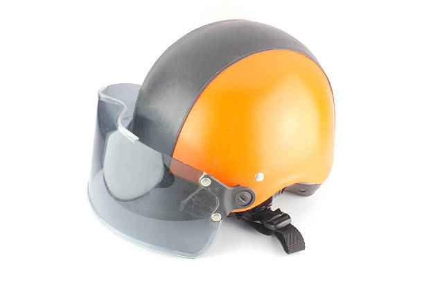 istock Orange black motorcycle helmet 494209383