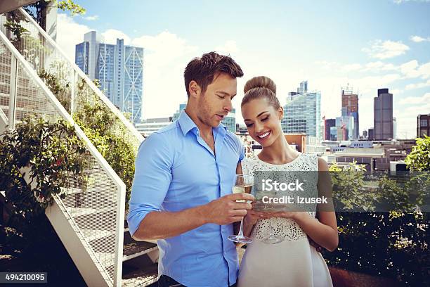 Romantic Couple Stock Photo - Download Image Now - Luxury, Balcony, Drinking