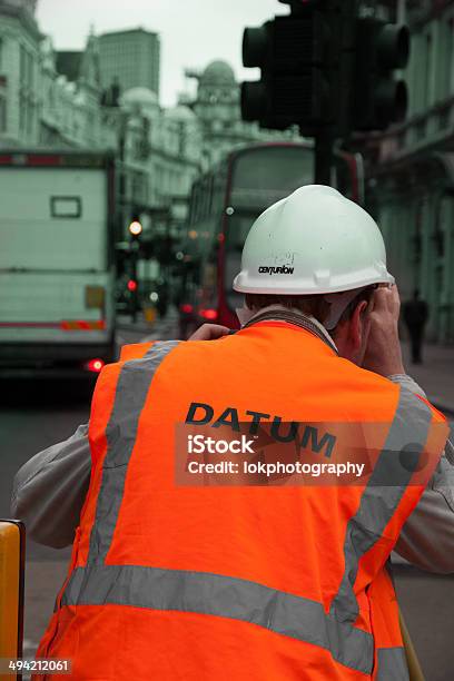 Datum Monitoring Worker In London Stock Photo - Download Image Now - Baby Bib, Blue-collar Worker, Capital Cities