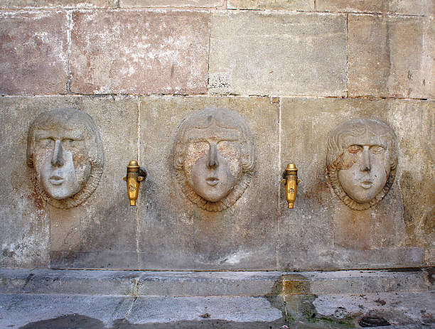 istock Antique street drink water source in Barri Gotic, Barcelona 494212461