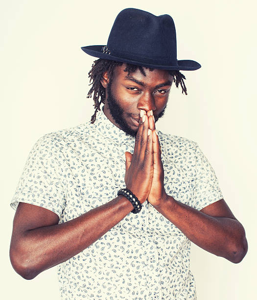 istock young handsome afro american boy in stylish hipster hat gesturing 494212556