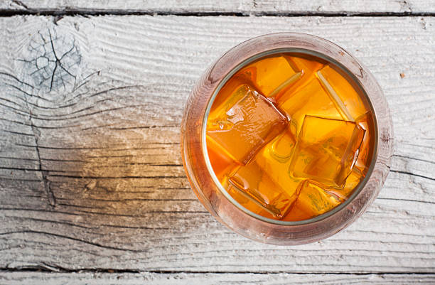 istock Glasses of brandy in cellar with old barrels 494213468
