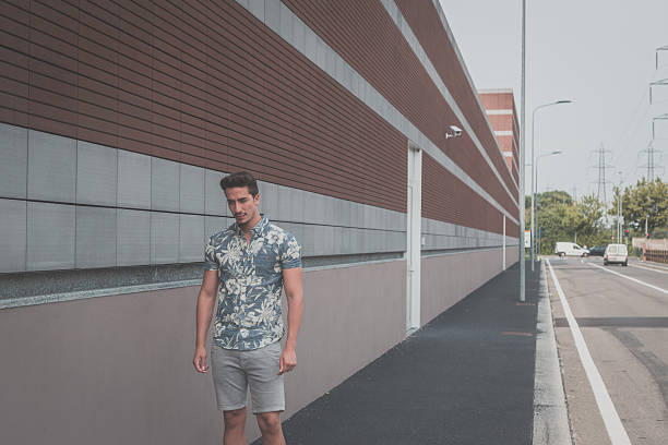 istock Young handsome man posing in the street 494213594