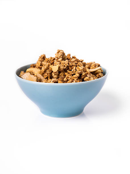 istock Muesli in bowl  on white background 494215664