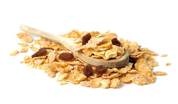 istock Oat flakes in the wooden spoon on white background 494215792